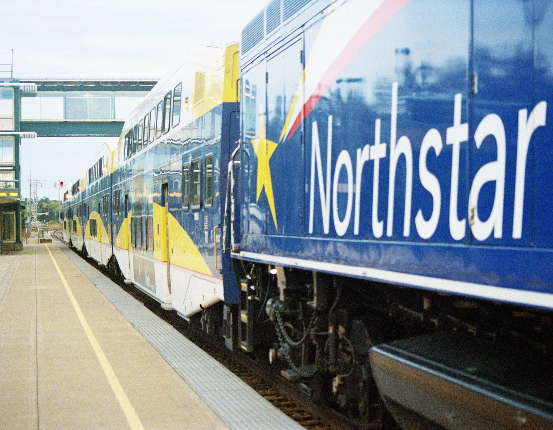 A close-up shot of a train stopped at a station.
